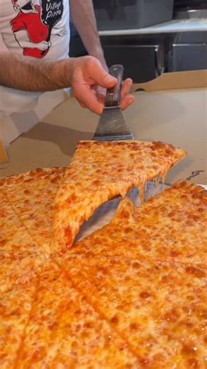 New York City Style Pizza always, always hits. 👌 This is the regular Cheese Pizza from East Village Pizza in NYC! 🍕🗽🤤 #DEVOURPOWER | DevourPower