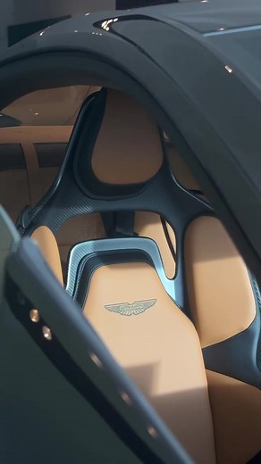 Explore the 2025 Aston Martin DB12: Minotaur Green with Oxford Tan Interior
