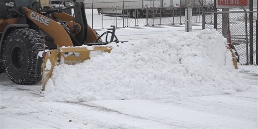Workers continue to remove snow after recent storm