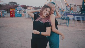 Girls smiling at the amusement park - Free Stock Video