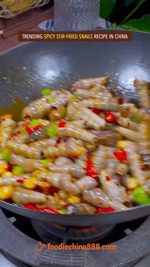 79K views · 657 reactions | Trending spicy stir-fried snails recipe in China. Do you have the guts to try? #recipe #cooking #chinesefood #snails #spicyfood #streetfood | foodiechina888 | Facebook