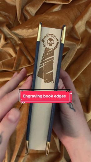 Engraving book edges with my @xtoolofficial F1 #laserengraving #warhammer40k #horusheresy #xtoolf1 #custombooks