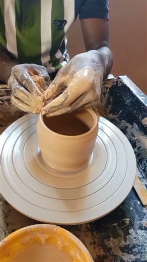 Making a clay mug today, starting from a simple lump and slowly guiding it into form.