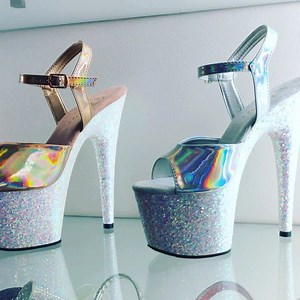 Holo-Glitter Glam join forces for heart eyes seen round the world w/ 🚨Coming Soon🚨 7” heel 2 3/4” platform #Pleaser Adore-709HGG holographic ankle strap sandals w/ opal iridescent covered glitter platforms. Available in US women’s 5-12 in Rose Gold & Silver On May 28th ♥️👠. #PleaserUSA #PleaserShoes #PleaserHeels #PolePleaser #VeganShoes : : : : : : : : : : : : #exoticdancershoes #exoticdancerheels #poleshoes #poleheels #sexyheels #sexyshoes #poledance #polefitness #poledancer #exoticdance #s