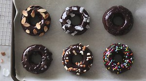 Chocolate chocolate donuts! Which topping would you want; roasted almonds, chocolate chips, sprinkles, sea salt, coconut or pretzels? Full video up on the blog today... | Preppy Kitchen