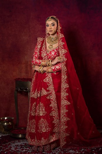 Feeling every bit like royalty in this classic red drape. 👸 ❤️ This one is our pure muslin saree intricate heavy zardosi work. Attire: OSHIN Makeover: Sparkle By Lamia Jewellery: Traditional Jewellery | OSHIN
