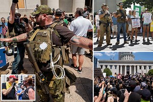 Anti-mask protesters & armed militia demonstrate outside Ohio statehouse calling coverings 'propaganda'