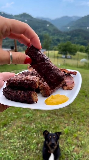 Romanian Mici, also known as Mititei, hold a special place in the country's culinary landscape and street food culture. These small, skinless sausages are a beloved traditional dish enjoyed by locals and visitors alike. The word "mititei" translates to "little ones" in Romanian, aptly describing the petite size of these flavorful sausages. Prepared by combining ground meat, often a mixture of beef and pork, with a blend of spices such as garlic, black pepper, and paprika, Mici are known for thei