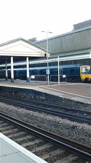 GWR Class 166 departing Exeter St Davids with a two tone