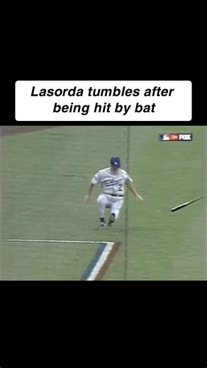 7/10/01: Third base coach Tommy Lasorda takes a nasty spill after a broken bat hits him but quickly recovers. (via MLB) #baseball #MLB #throwback | MLB Throwbacks