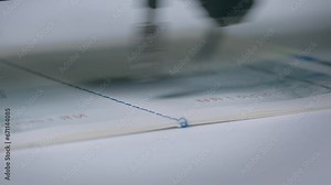 Assigning a unique number to a document. Burning the number in the passport. Production of documents. The laser produces numbering on the pages of the document. Laser light burns out numbers letteкrs.