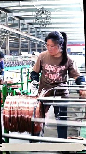 Copper Wire Coil Transfer Process in an Industrial Cable Manufacturing Facility