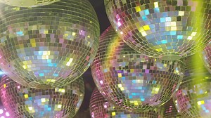 Mirror balls and stage lights at party