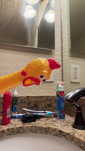 A brushing teeth chicken #ruberchicken #viral #fyp #trending #toy #like #teethcleaning