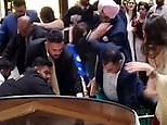 Shocking moment violent mass brawl erupts at lavish wedding