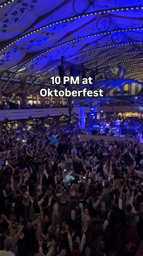 “It’s 10 PM, the crowd’s wild, the air smells like pretzels & joy — this is the heartbeat of Oktoberfest. 🎶🍻” #BavarianNights #OktoberfestMagic #CheersToMemories #MunichMood #BeerFestivalVibes #FYP | Delicious Deutschland