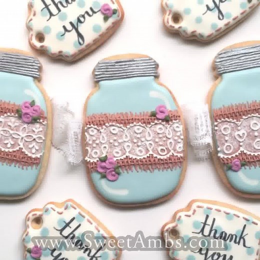 Watch the full video on how to decorate mason jar cookies here: http://www.sweetambs.com/tutorial/mason-jar-cookies-with-burlap-and-lace/ Mason Jar Cookie Cutter: http://bit.ly/1TasyRF Music courtesy of Audio Network: http://us.audionetwork.com/browse/m/track/celebrated-minuet_96134 | SweetAmbs
