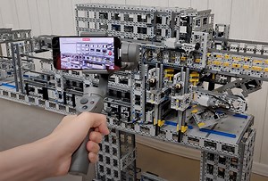 Brick Master Uses LEGO Technic Parts to Construct an Amazing Bridge-Building Factory