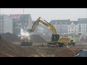 Bagger Volvo EC 300 und CAT 336 baggern bis der Nebel kommt