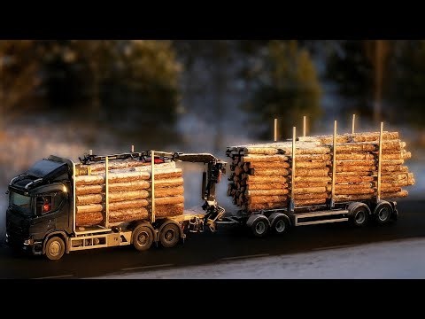 Massive Timber Truck Rolling Down a Country Road