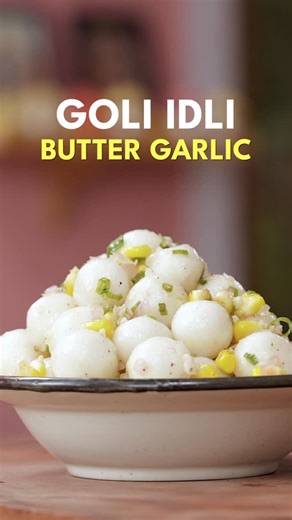 Goli Idli (Butter Garlic) 😍 Recipe you will love to have everyday! [goli idli recipe, butter garlic idli, idli recipes, south indian breakfast, easy idli recipe, leftover idli recipe, crispy idli fry, masala idli, indian street food, tiffin recipes, kids lunch box ideas, instant snack recipes, quick south indian snacks, idli chutney combo, healthy indian snacks, evening snack ideas, party snack recipe, idli variations, butter garlic recipes, indian veg snacks] | Kunal Kapur