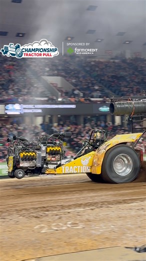 “Giddy Up” Super Modified Tractor roaring through Freedom Hall during the Finals of the 2025 National Farm Machinery Show Championship Tractor Pull presented by Farm Credit Mid-America! #NFMS26 #TractorPulling #Motorsport #FarmShow #Louisville | Thurston Pulling Photos
