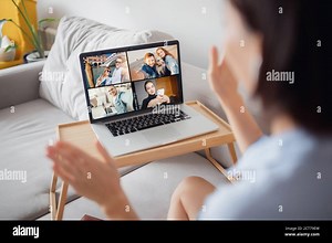 Online video call to friends via computer. Girl waves people hand gesture hello Stock Photo - Alamy