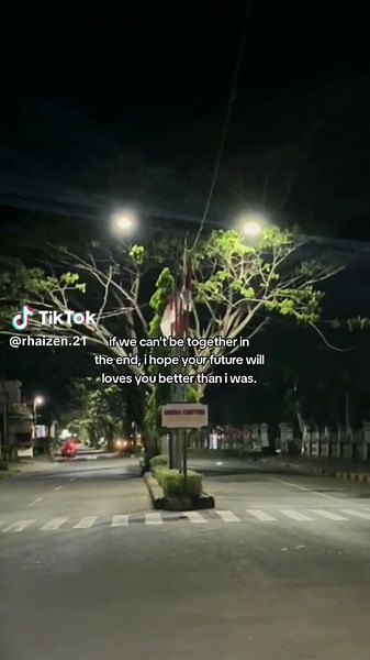 Nighttime Street Scene with Illuminated Tree