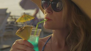 Enjoying a cocktail in the evening - Free Stock Video