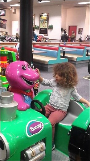 Barney tractor coin operated ride at Chuck E Cheese