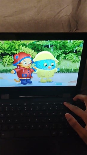 Daniel tiger and o the owl jumping in a big puddle