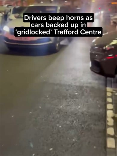⬆️ READ MORE VIA LINK ABOVE ⬆️ Video footage showed horns blaring in fury as shoppers became trapped in car parks at Trafford Centre on Monday (December 29). Motorists were stuck in 'gridlocked' queues at a number of car parks around the popular shopping centre throughout the afternoon and into the evening. Visitors headed to the huge shopping outlet for discounted sales following the Christmas period, but quickly took to social media after becoming trapped in their vehicles for a number of hour