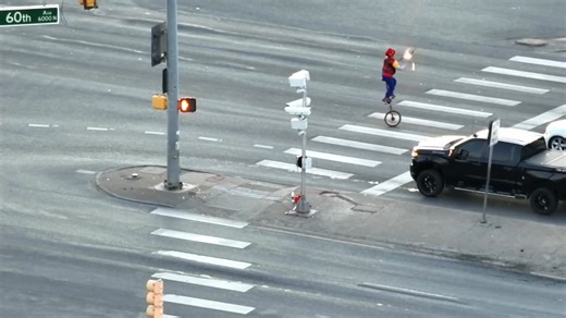 A fire-juggling unicyclist was caught on camera performing in a busy intersection in Colorado last week. The Commerce City Police Department posted this video of the act, saying it was "quite good,” but it was also illegal because the unicyclist was trespassing in the median and didn’t exit the crosswalk in time. 🎥: Commerce City Police Department | KAKE News