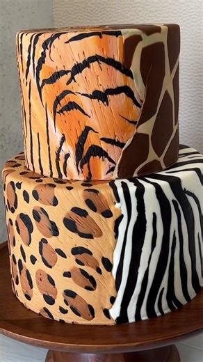 After I’m finished filming a tutorial, I like to rip the fondant off of the dummies, smoosh it all up, and re-roll it to cover another dummy so I can see how the marbling turns out. I find it very satisfying. I really like how this one came out. It looks very safari without being an actual animal print. What do you think? #animalprint #safari #fondantcake #cakevideo #cakedecorating #cakeplay #playwithyourfood ithyourfood
