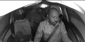 Cab driver assaulted with Wild Turkey bottle, crashes into home