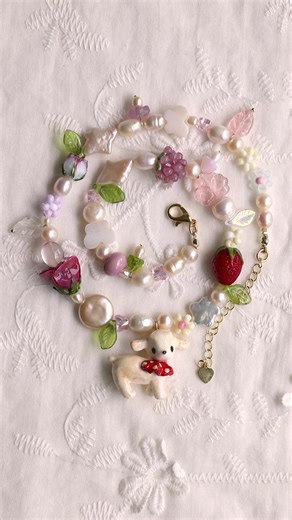 Had the best time making these baby lamb charms 🐑🐑🐑✨ Created with mixed media including clay, acrylic, resin, etc. #artwork #polymerclay #claycharms #aesthetic #fairycore #coquette #coquetteaesthetic #handmade #craft #miniature #smallbusinesstiktok #clayart #whimsical #whimsicaljewelry #fyp #beadedjewelry