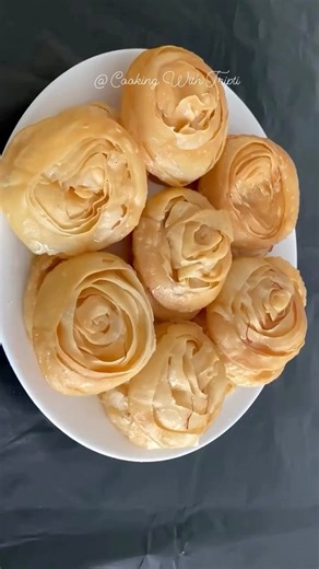 Easy Khaja Recipe Ingredients: 2 cup all purpose flour (maida) 2 pinch salt 4 tbsp clarified butter (ghee) 4 tbsp cornflour/ Maida 4 tbsp ghee Oil for frying For sugar syrup: 1 cup sugar 1/2 cup water 1 tsp cardamom powder 1 pinch saffron strands (optional) ………………………………………………… #khaja #khajarecipe #sweet #indiansweets #biharfood #easyrecipes #indianfood #mithai #food #foodie #foodlover #foodporn #foodblogger #foodstagram #khajalover #cook #cooking #reels #reelsinstagram | Cooking_with_tripti