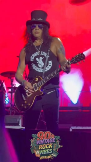 The iconic duo in Red & Black! 🎸🌹 #gnr #axel #slash #concert #90s #vintagerock