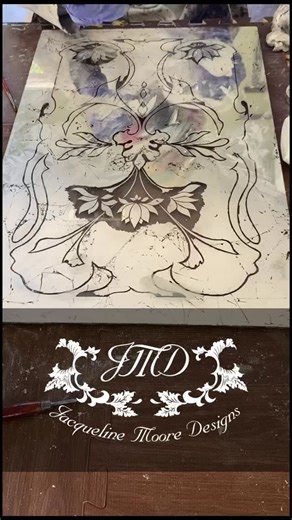 Jacqueline Moore Designs on Instagram: "A process which is, in our opinion, as equally satisfying to watch as it is to do! Making way for the first layers of color… 🌱🍂 #artnouveaustyle #verreeglomise #eglomise #paintedglass #dremel"