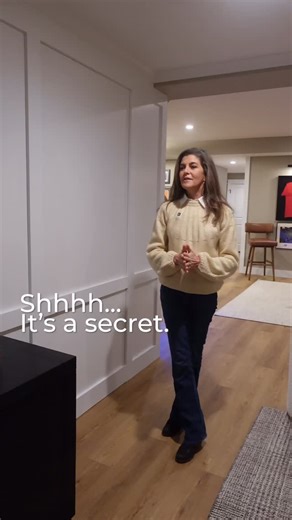 Great design doesn’t ask you to choose between beauty and function. When Deneen needed to create convenient access to a storage space, she didn’t want it to interrupt the visual flow of the room. She designed a paneled wall with a hidden door that blends seamlessly into the architecture. It gives easy access to the refrigerator/freezer while keeping the space cohesive, and intentional. The best details are often the ones you don’t notice at first glance. | KP Designs Group