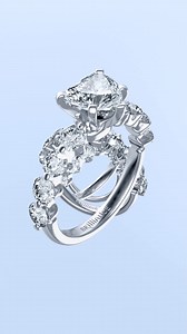 Introducing the Floating Diamonds Engagement Ring - where every diamond seems to defy gravity. Crafted to shimmer from every angle, this design redefines timeless elegance. 💎 | Brilliance.com