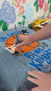 🏀✨ Game day just got personal! Custom painted jackets with your team and name - limited spots available! 👏💙 #smallbusinessowner #paintingvideo #smallbusiness #personalizedgift #gamedaystyle #teamspirit #sportsmom #sportsmomlife | The Redheaded Camel