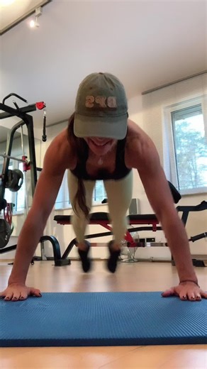 Plank Exercise Demonstration in a Bright Gym