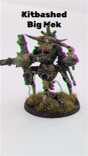 Kitbashed Big Mek I built from scrap before I got 2 official models for Christmas