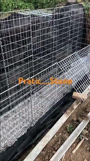 How to build a retaining wall with stone( Gabion Installation)