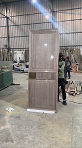 Oakwood doors & interio on Instagram: "Luxury Engineered Veneer Door🥂 This engineered veneer door has a PU acrylic high gloss finish. It’s 54mm thick and has a design on both sides. The lock area has a brush gold finish, and we used a veneer turning technique. The door is veneer wrapped everywhere, so there’s no exposed wood and the upper panel protrudes outward, while the lower panel goes inward, creating an illusion that looks very luxurious🚪 ☎️9971228775 • • • #doorsofinstagram #reelsinstag