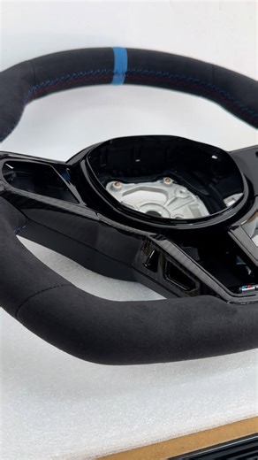 BMW G8x LCI Alcantara steering wheel. So hot, can't touch it ! 🔥 DM if you want one... 😎 #modmania #bmw #g80 #g82 #m3g80 #bmwmotorsport #retrofit #car #cartuning | MOD MANIA Store