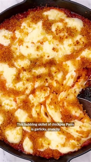 This crispy, bubbling skillet Parmesan for the chickpea lovers in your life. Get the recipe by Sheela Prakash now on NYT Cooking! (Video by @carolinagelen) #chickpeas #chickenparm #parmesan #chickpeasrecipe