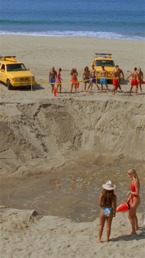 The team wakes to find a mysterious hole has appeared on the beach. | Baywatch