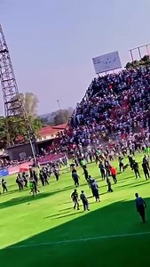 1.6K views · 30 reactions |  SPORTS NEWS // Dynamos F.C vs Highlanders Fc Castle Lager Premier Soccer League tie was temporarily stopped at Barbourfields Stadium after Bosso fans invaded the pitch . The fans are unhappy with some of the decisions made by referee. Dynamos was leading 2-0. #zimdancehall #music #havokzw #entertainment #entblogger #supportlocal #afropopmusic #Afrobeats #zimdancehall #music #havokzw #entertainment | Havok Live | Facebook